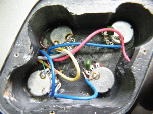 Fake Gibson electronics cavity with cheap electronics and wiring
